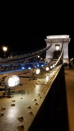 View of illuminated bridge at night
