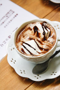 Close-up of coffee cup on table