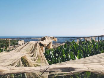 Panoramic shot of sea against clear sky