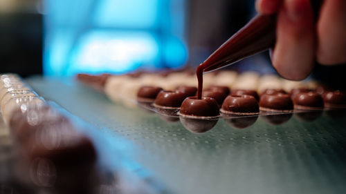 Close-up of person preparing food