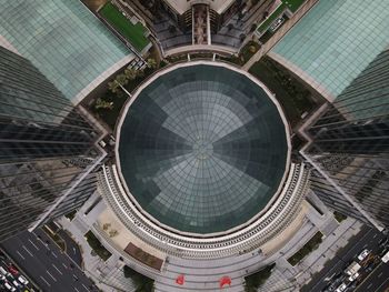 Symmetric round glass dome shot from above with drone in shanghai