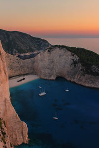 Scenic view of sea against sky at sunset