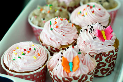 High angle view of cupcakes on table