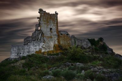 Old ruins against cloudy sky