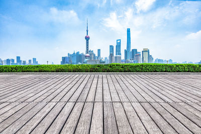 Modern buildings in city against sky