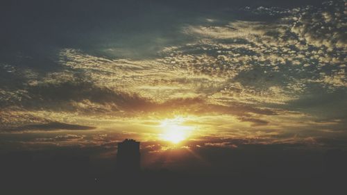 View of buildings at sunset