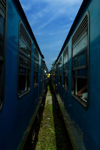 Train on railroad tracks against sky