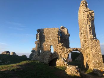 Low angle view of historic building against sky