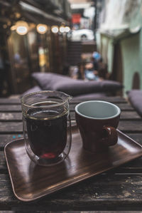 Close-up of coffee served on table at cafe