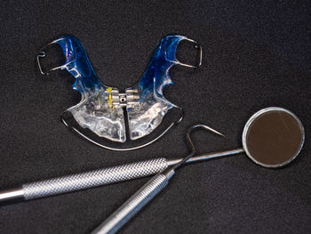 High angle view of drink on table against black background