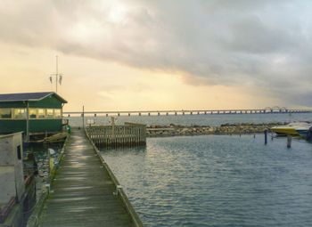 Pier over sea against sky