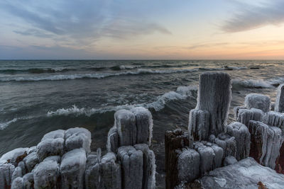 Scenic view of sea against sky during sunset