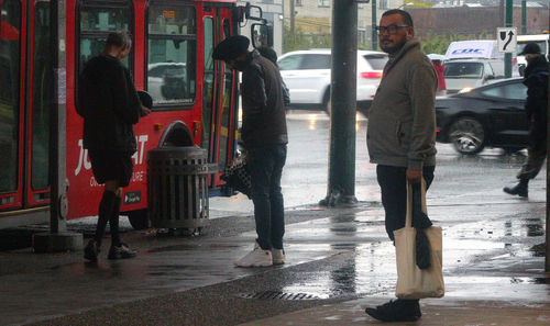 Men standing in city