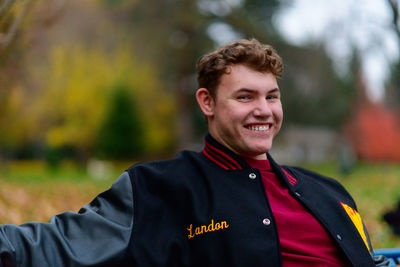 Portrait of young man smiling at camera