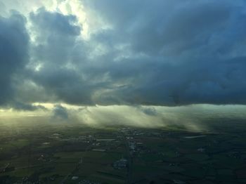 Storm clouds over landscape