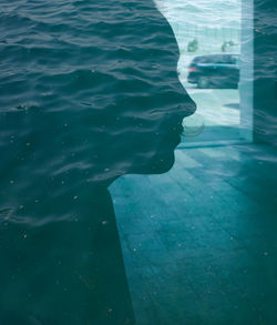 Close-up of woman swimming in pool