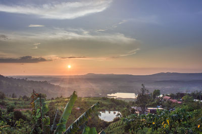 High angle view of townscape against sky during sunset