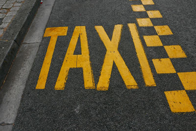 High angle view of taxi sign on street