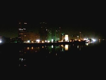 Illuminated cityscape at night