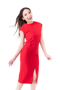 Portrait of a smiling young woman against white background