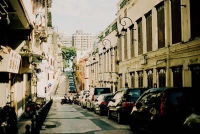 Narrow street along buildings