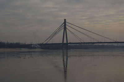 Bridge over river against sky