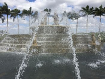 View of water flowing through rocks