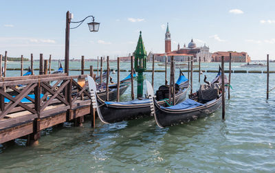 Boats moored at canal