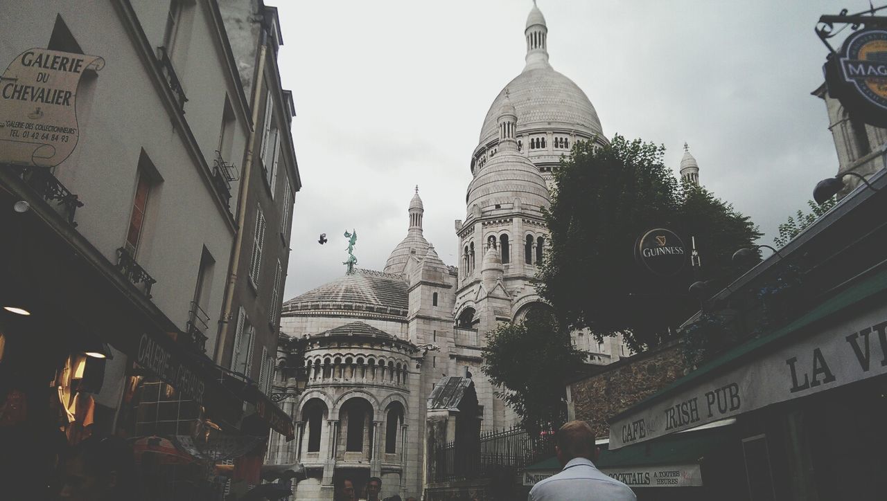 building exterior, architecture, built structure, religion, place of worship, church, spirituality, low angle view, sky, cathedral, city, travel destinations, famous place, dome, history, travel, clock tower, tourism