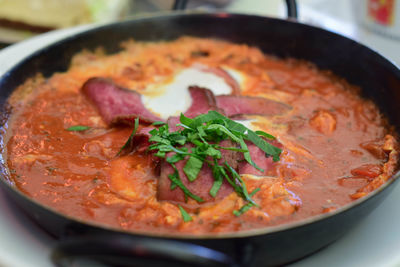 High angle view of meat in bowl on table