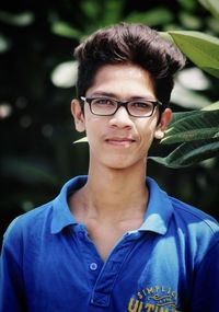 Portrait of young man wearing eyeglasses