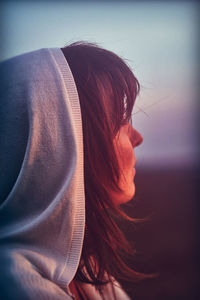 Close-up of woman wearing hooded shirt
