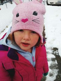 Portrait of cute girl in snow