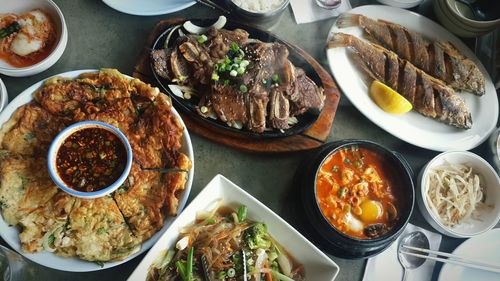 High angle view of fresh meal served on table at restaurant