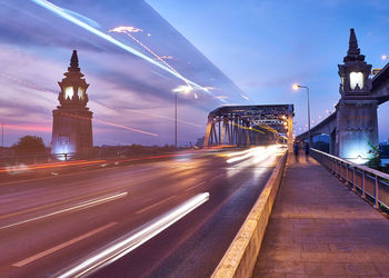 Light trails on bridge at night