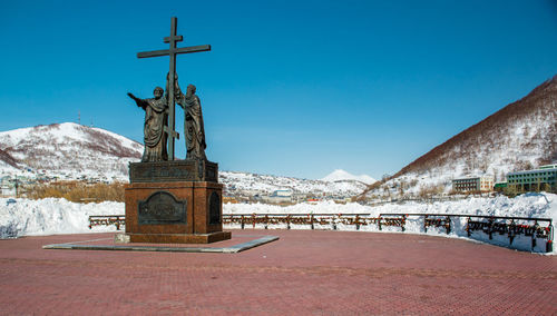 Statue of church in winter