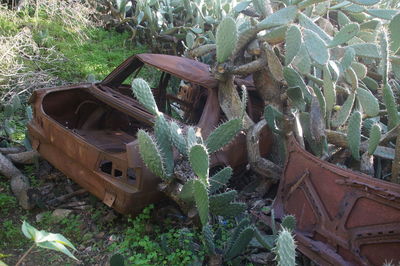 High angle view of old abandoned truck on field