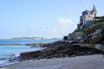 Scenic view of beach against clear sky