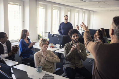 Group of business people having meeting in office