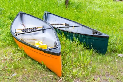 High angle view of boat moored on field