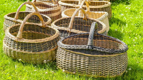 Close-up of wicker basket on field