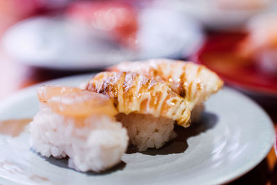 Close-up of bread in plate on table