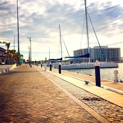 Boats moored at harbor