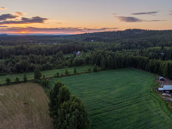 Scenic view of landscape against sky during sunset