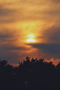 Low angle view of dramatic sky during sunset