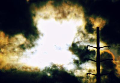 Low angle view of lamp post against sky