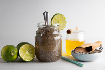 Close-up of fruits in jar on table