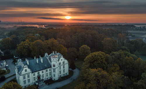 High angle view of townscape against sky during sunset