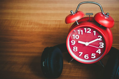 Close-up of clock on table