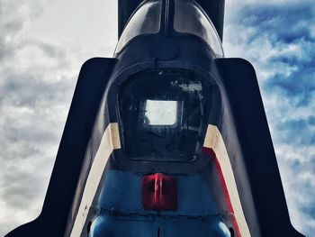 Low angle view of airplane against sky